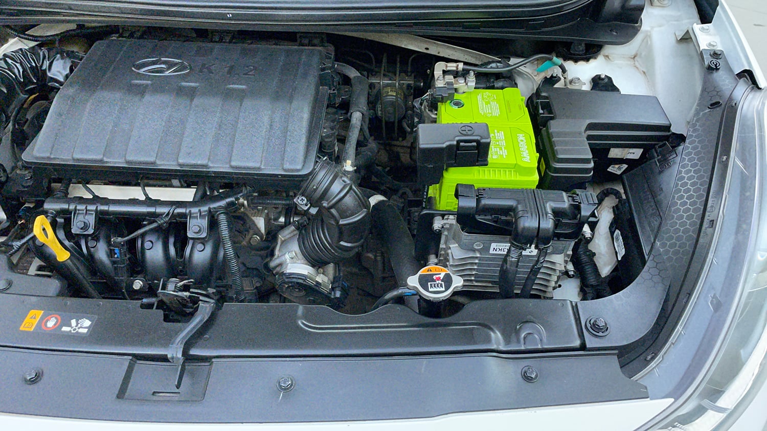 Used 2022 Hyundai Grand i10 Nios Asta AMT 1.2 Kappa VTVT Petrol Automatic engine ENGINE LEFT SIDE VIEW