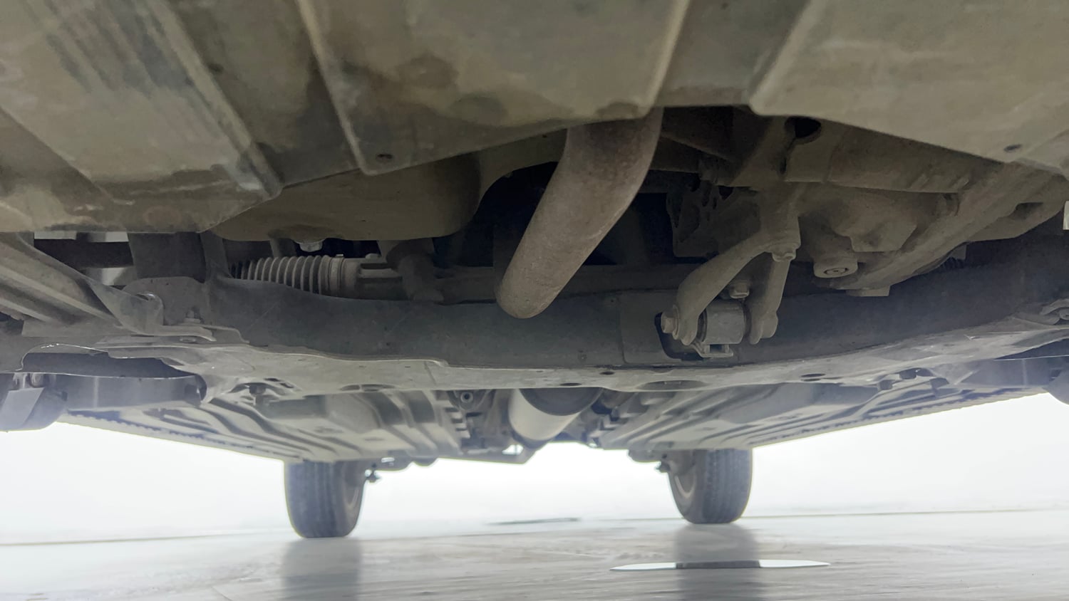 Used 2023 Maruti Suzuki Grand Vitara Delta Smart Hybrid AT Petrol Automatic extra FRONT LEFT UNDERBODY VIEW