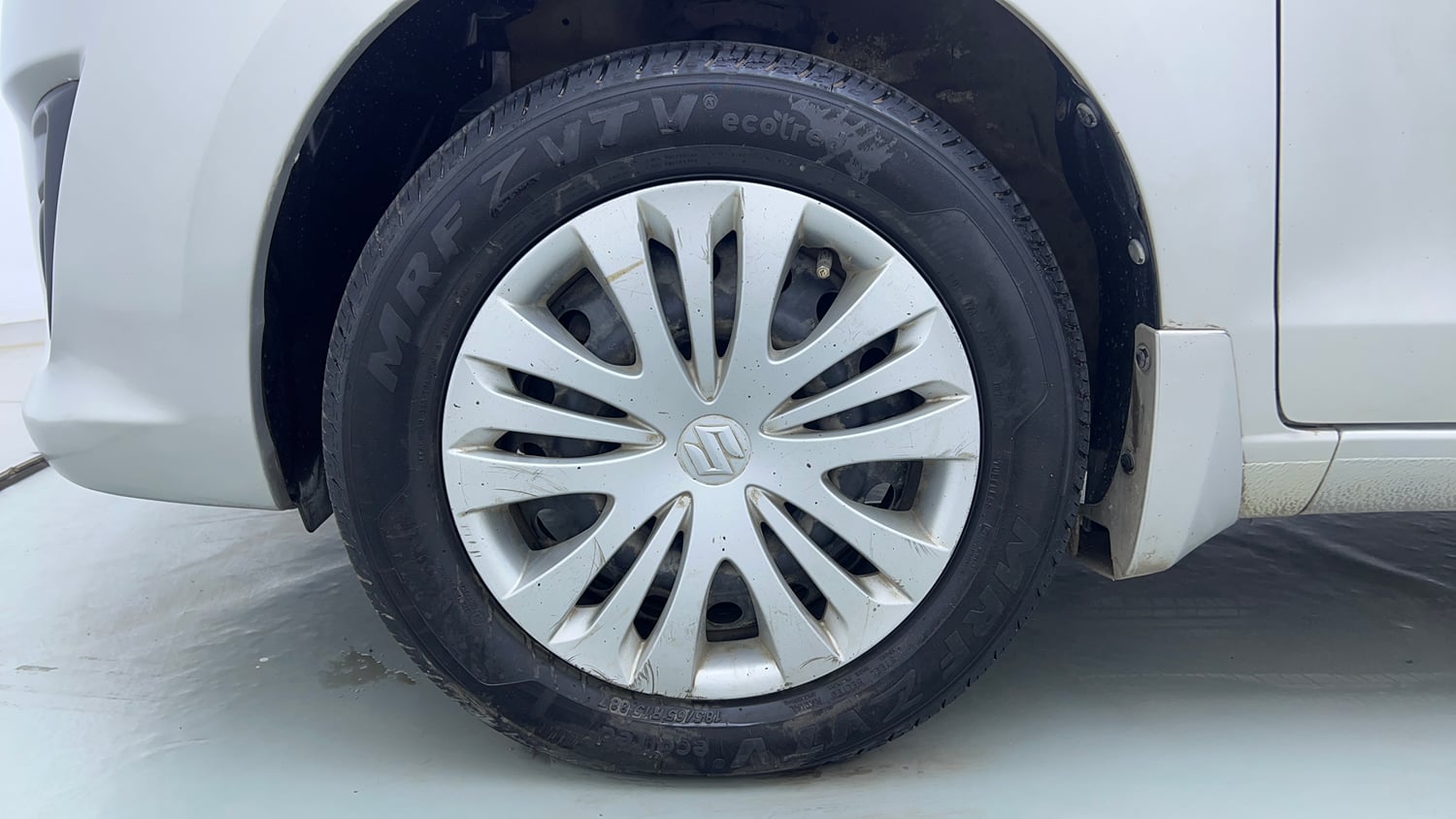 Used 2015 Maruti Suzuki Ertiga Vxi Petrol Manual tyres LEFT FRONT TYRE RIM VIEW
