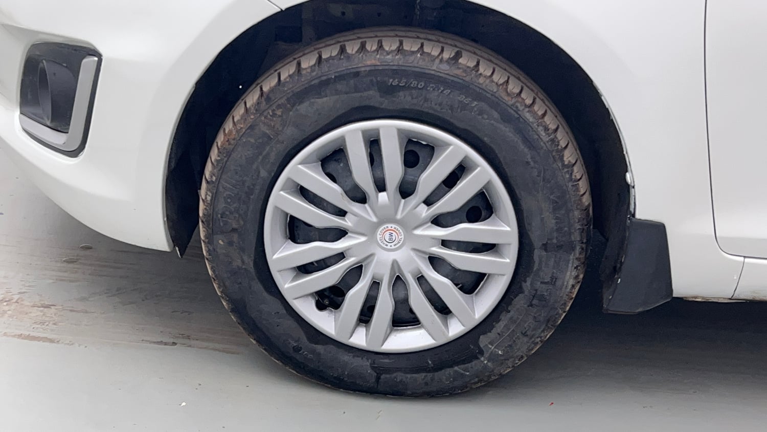 Used 2015 Maruti Suzuki Swift VXi Petrol Manual tyres LEFT FRONT TYRE RIM VIEW
