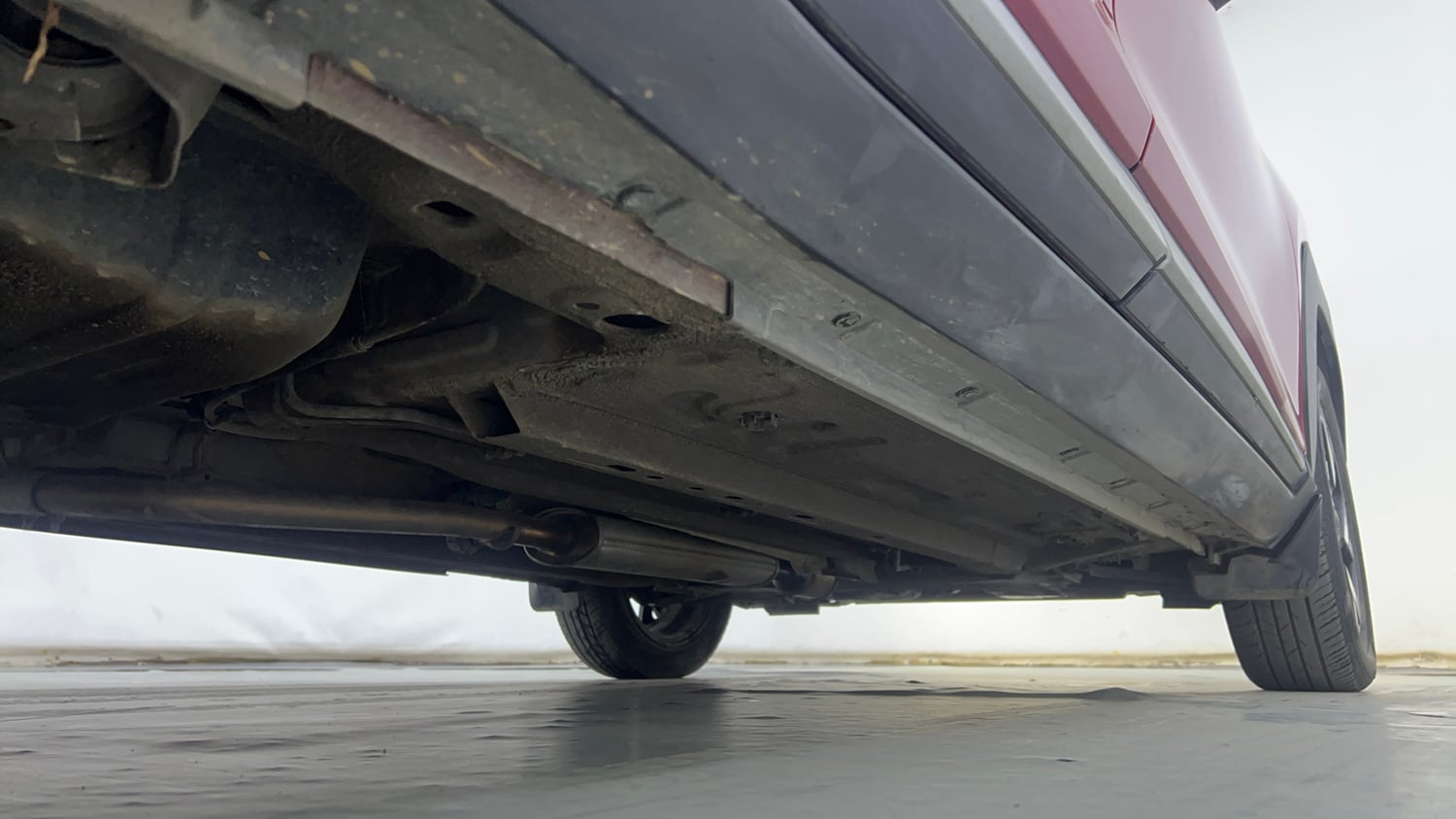 Used 2024 Nissan Magnite XV Premium Turbo CVT Dual Tone Petrol Automatic extra REAR RIGHT UNDERBODY VIEW