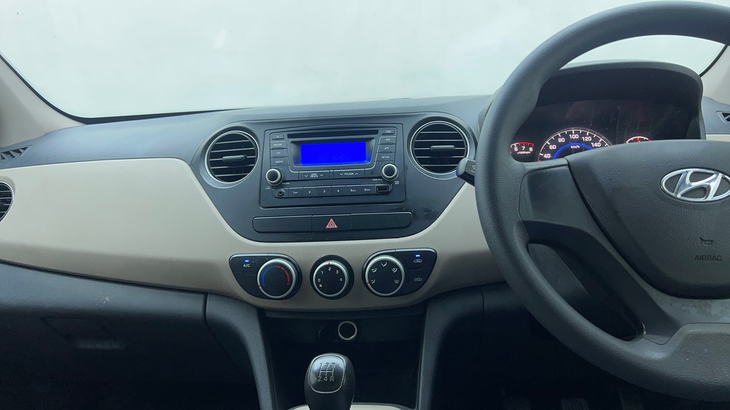 Used 2017 Hyundai Grand i10 Magna 1.2 Kappa VTVT Petrol Manual top_features Integrated (in-dash) music system