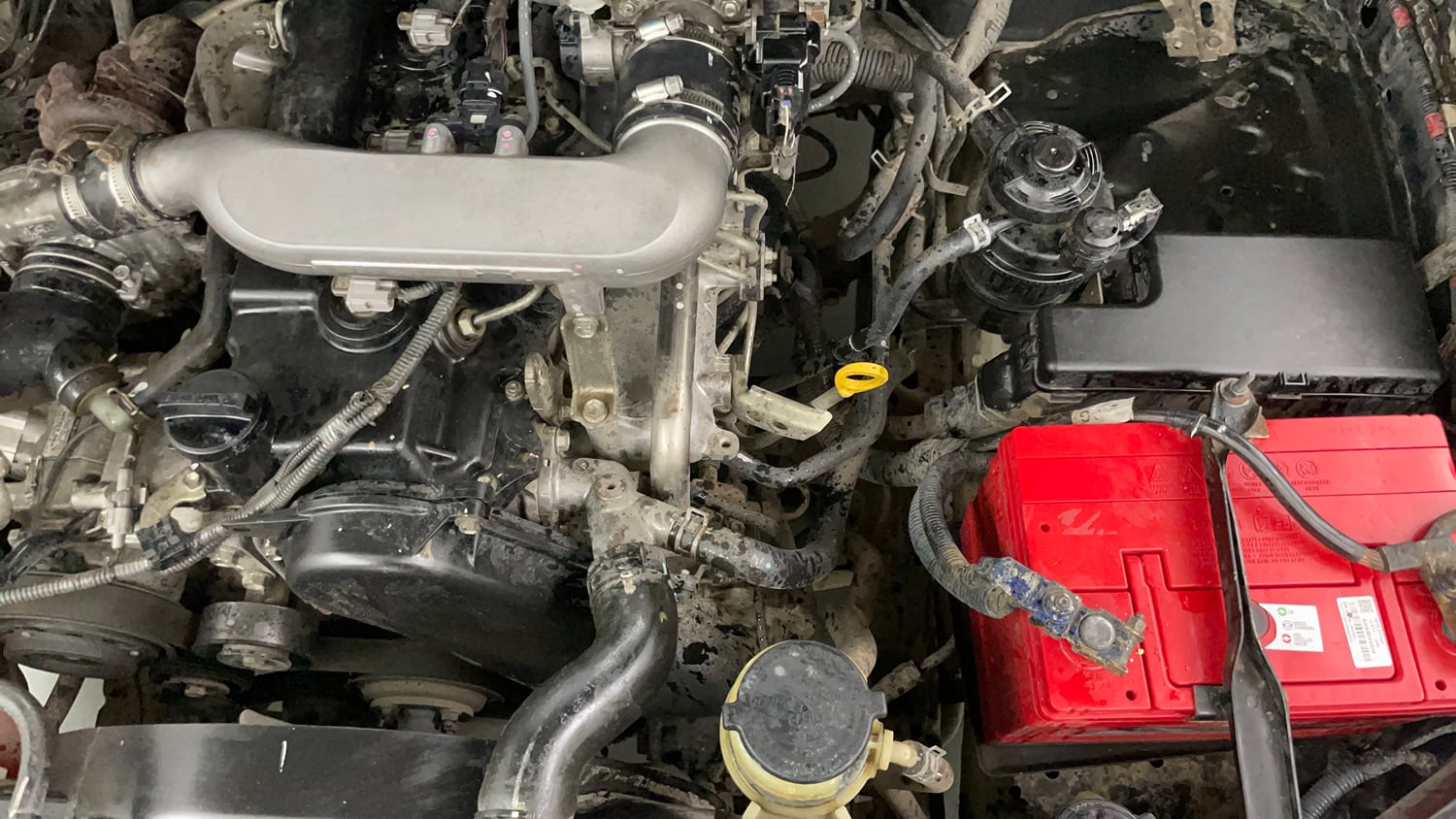 Used 2013 Toyota Innova 2.5 GX 8 STR BS-III Diesel Manual engine ENGINE LEFT SIDE VIEW
