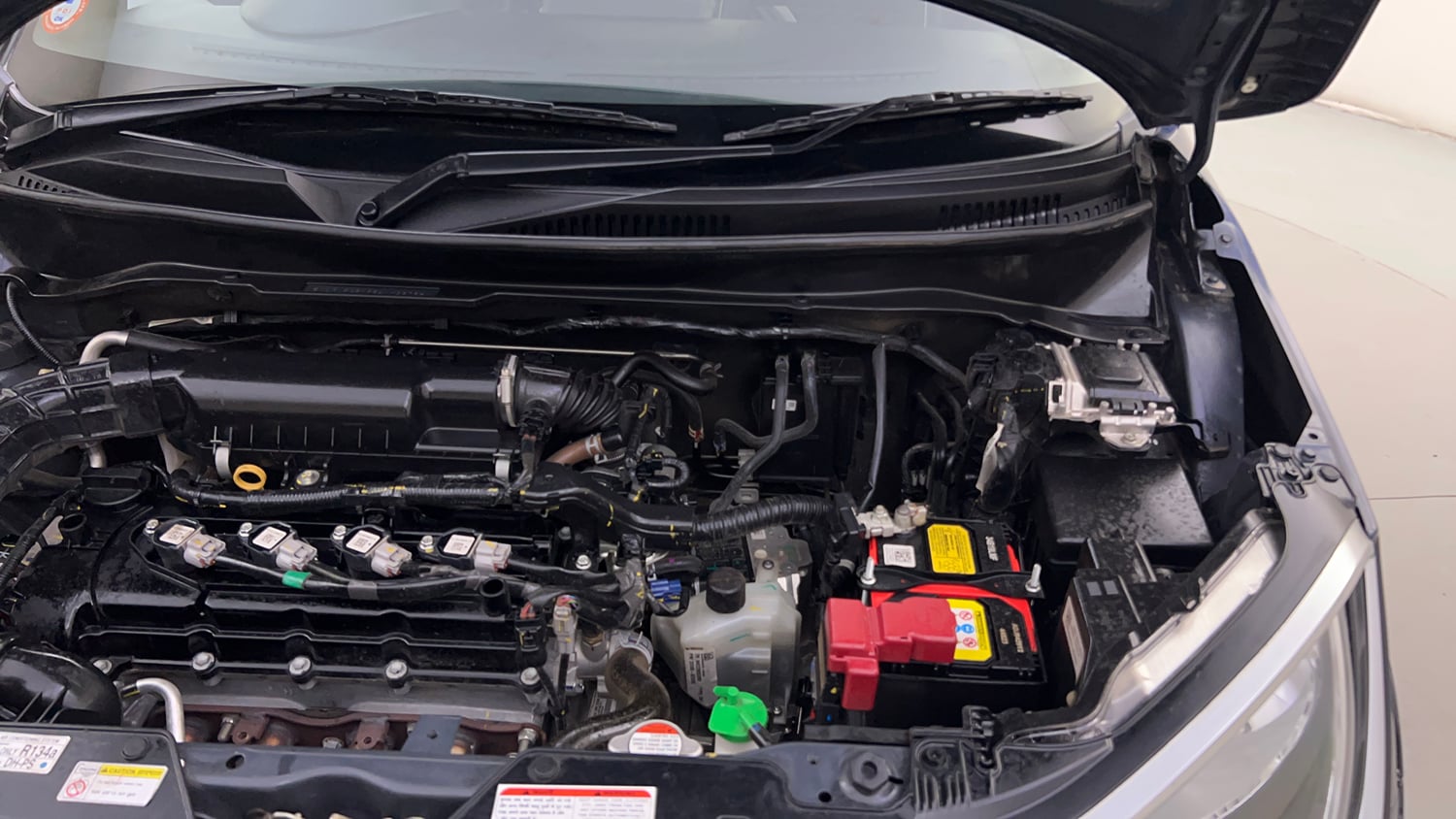 Used 2024 Maruti Suzuki Ignis Zeta 1.2 AMT Petrol Automatic engine ENGINE LEFT SIDE HINGE & APRON VIEW
