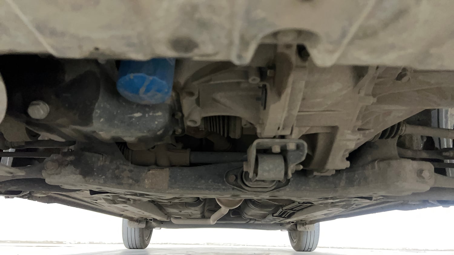 Used 2021 Hyundai Aura SX 1.2 Petrol Petrol Manual extra FRONT LEFT UNDERBODY VIEW