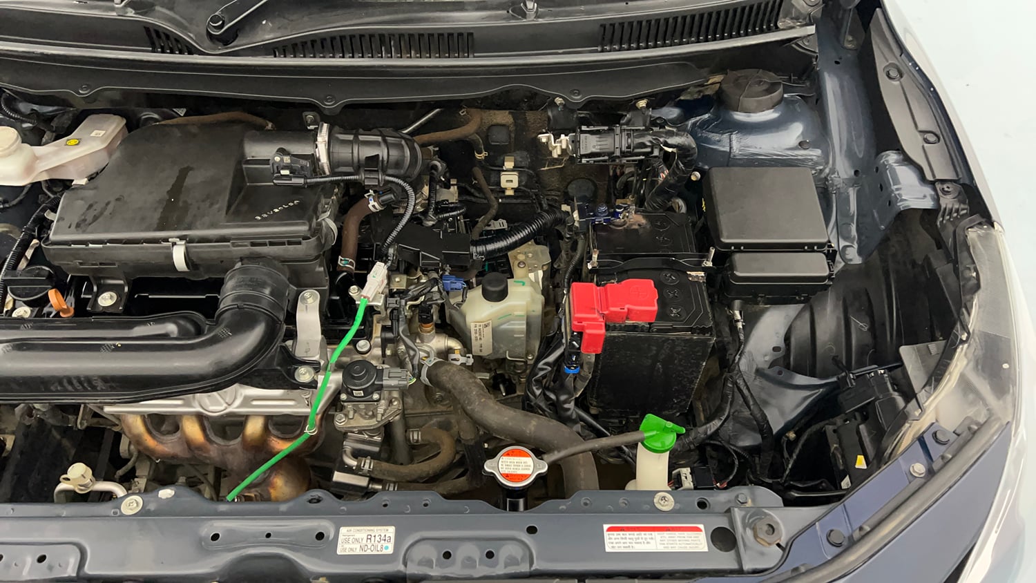 Used 2023 Maruti Suzuki Baleno Delta AGS Petrol Automatic engine ENGINE LEFT SIDE VIEW
