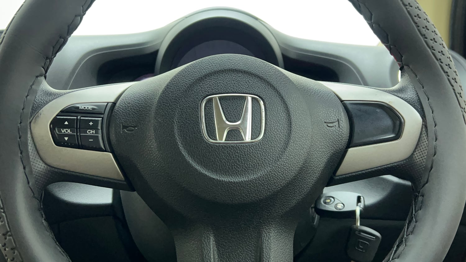 Used 2016 Honda Brio S MT Petrol Manual top_features Steering mounted controls
