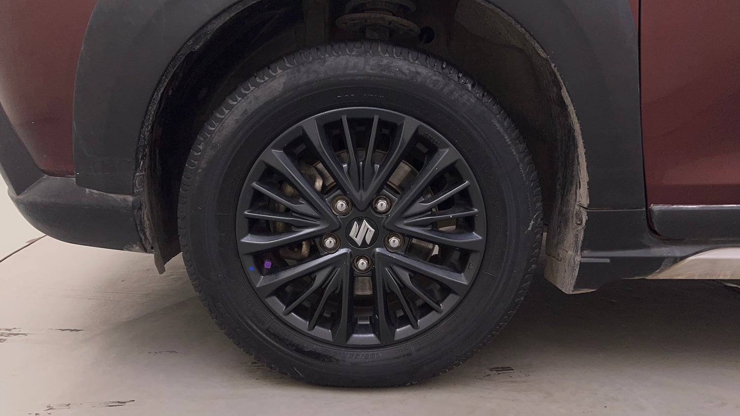 Used 2021 Maruti Suzuki XL6 Alpha MT Petrol Petrol Manual tyres LEFT FRONT TYRE RIM VIEW