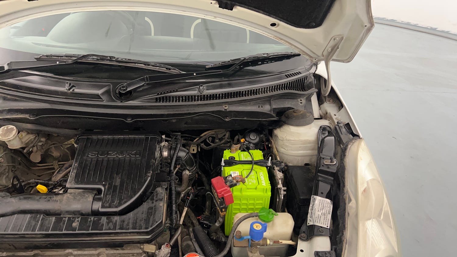 Used 2012 Maruti Suzuki Swift LXI CNG (Outside Fitted) Cng Manual engine ENGINE LEFT SIDE HINGE & APRON VIEW