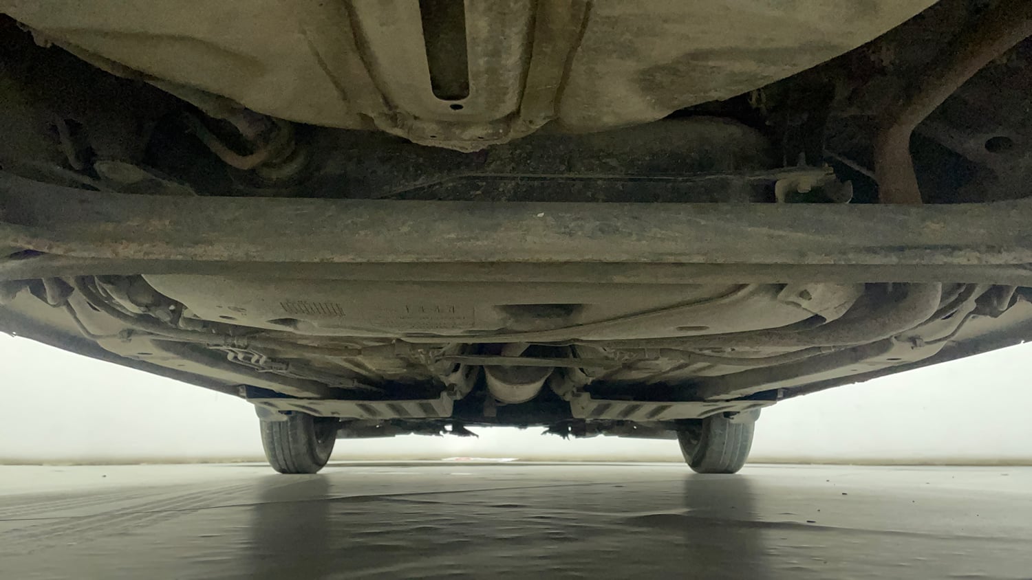 Used 2022 Maruti Suzuki Swift VXi Petrol Manual extra REAR UNDERBODY VIEW (TAKEN FROM REAR)
