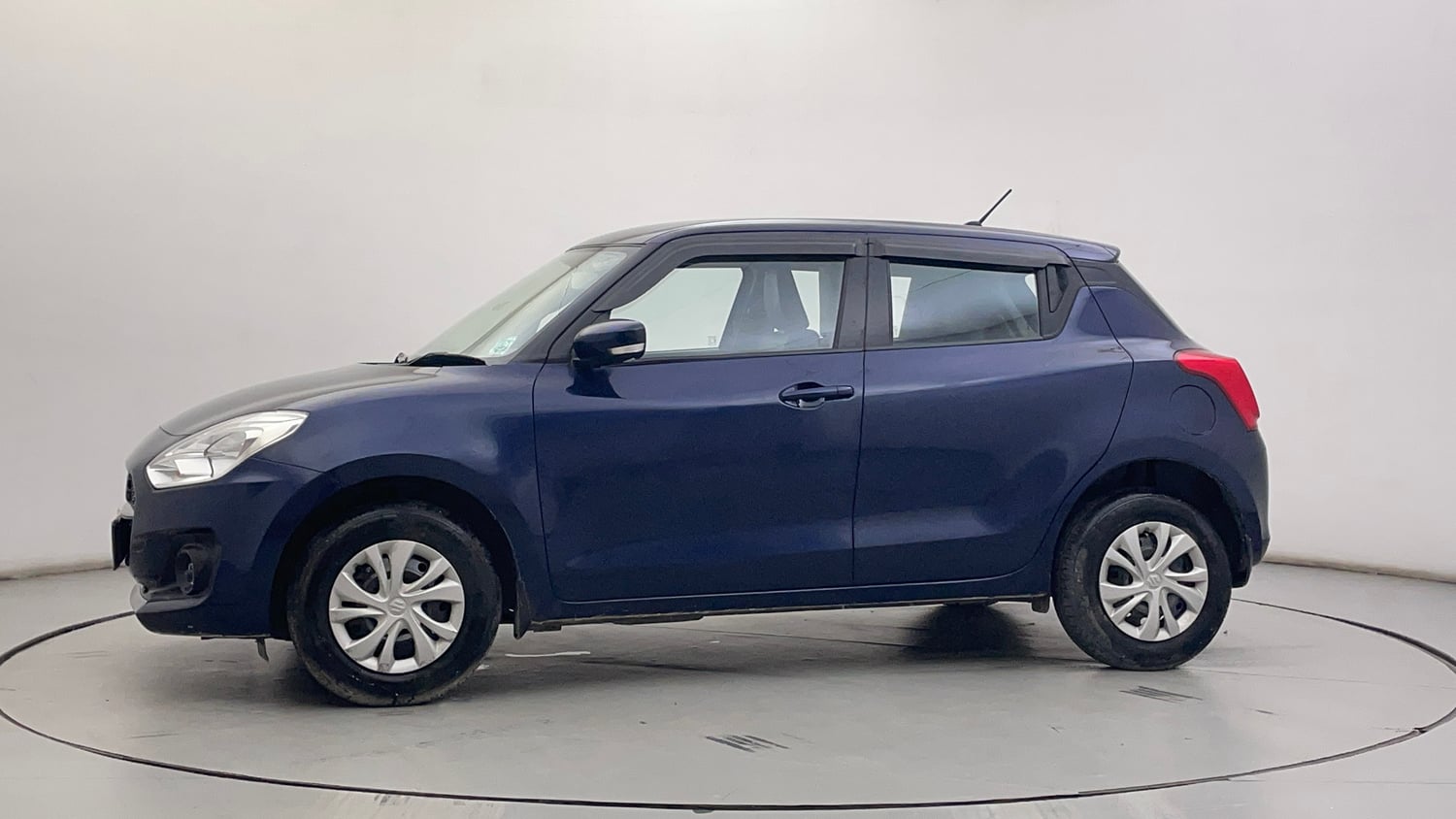 Used 2022 Maruti Suzuki Swift VXi Petrol Manual exterior LEFT SIDE VIEW