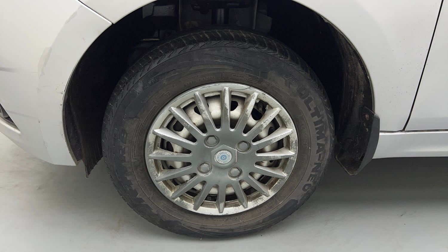 Used 2018 Tata Tiago Revotron XE Petrol Manual tyres LEFT FRONT TYRE RIM VIEW