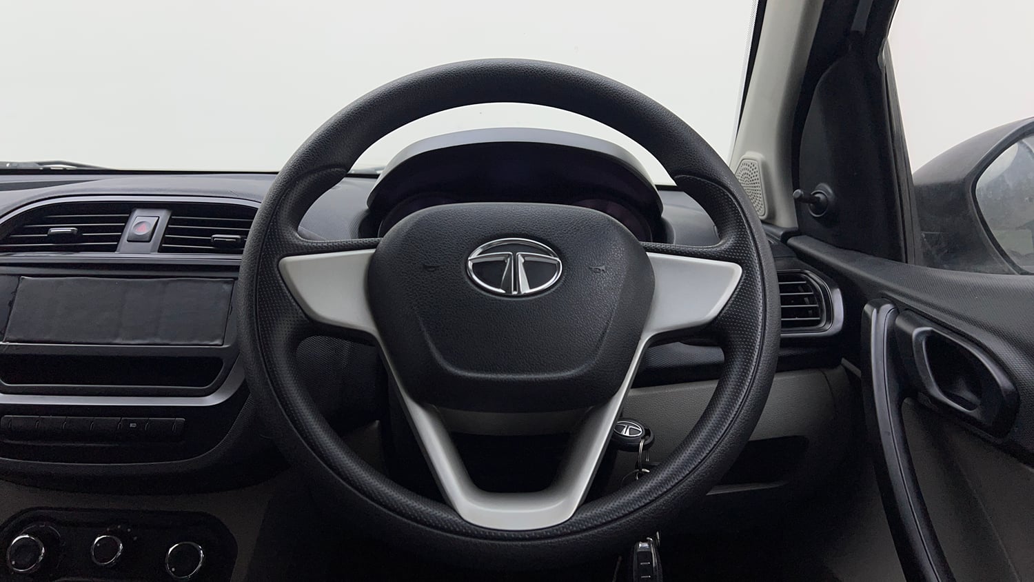 Used 2018 Tata Tiago Revotron XE Petrol Manual interior STEERING VIEW