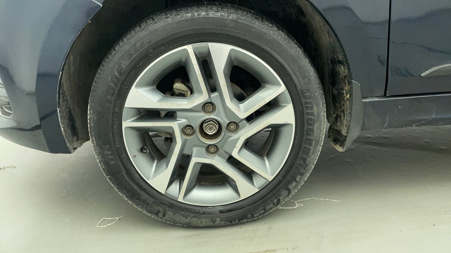 Used 2022 Tata Tigor XZ Plus Petrol Manual tyres LEFT FRONT TYRE RIM VIEW