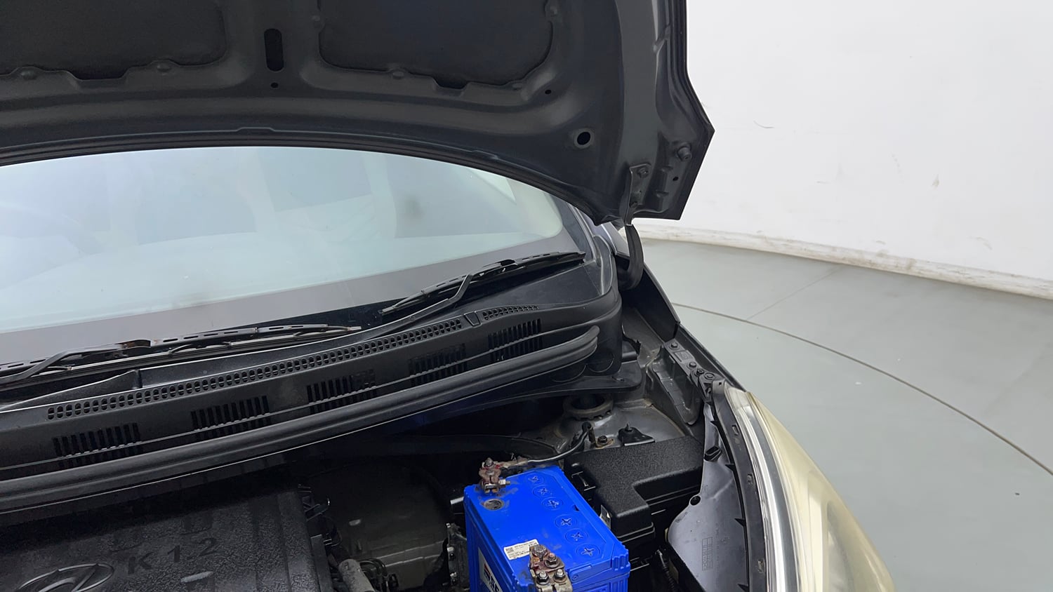 Used 2015 Hyundai Grand i10 Magna 1.2 Kappa VTVT Petrol Manual engine ENGINE LEFT SIDE HINGE & APRON VIEW