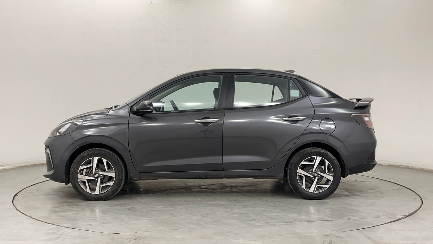 Used 2023 Hyundai Aura SX 1.2 CNG Cng Manual exterior LEFT SIDE VIEW