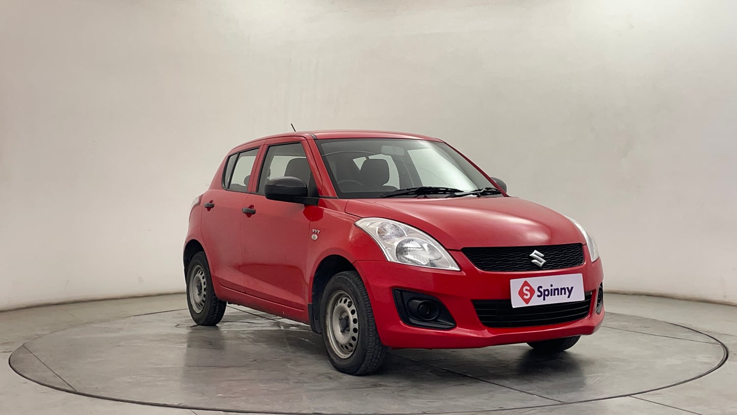 Used 2017 Maruti Suzuki Swift Lxi ABS (O) Petrol Manual exterior RIGHT FRONT CORNER VIEW