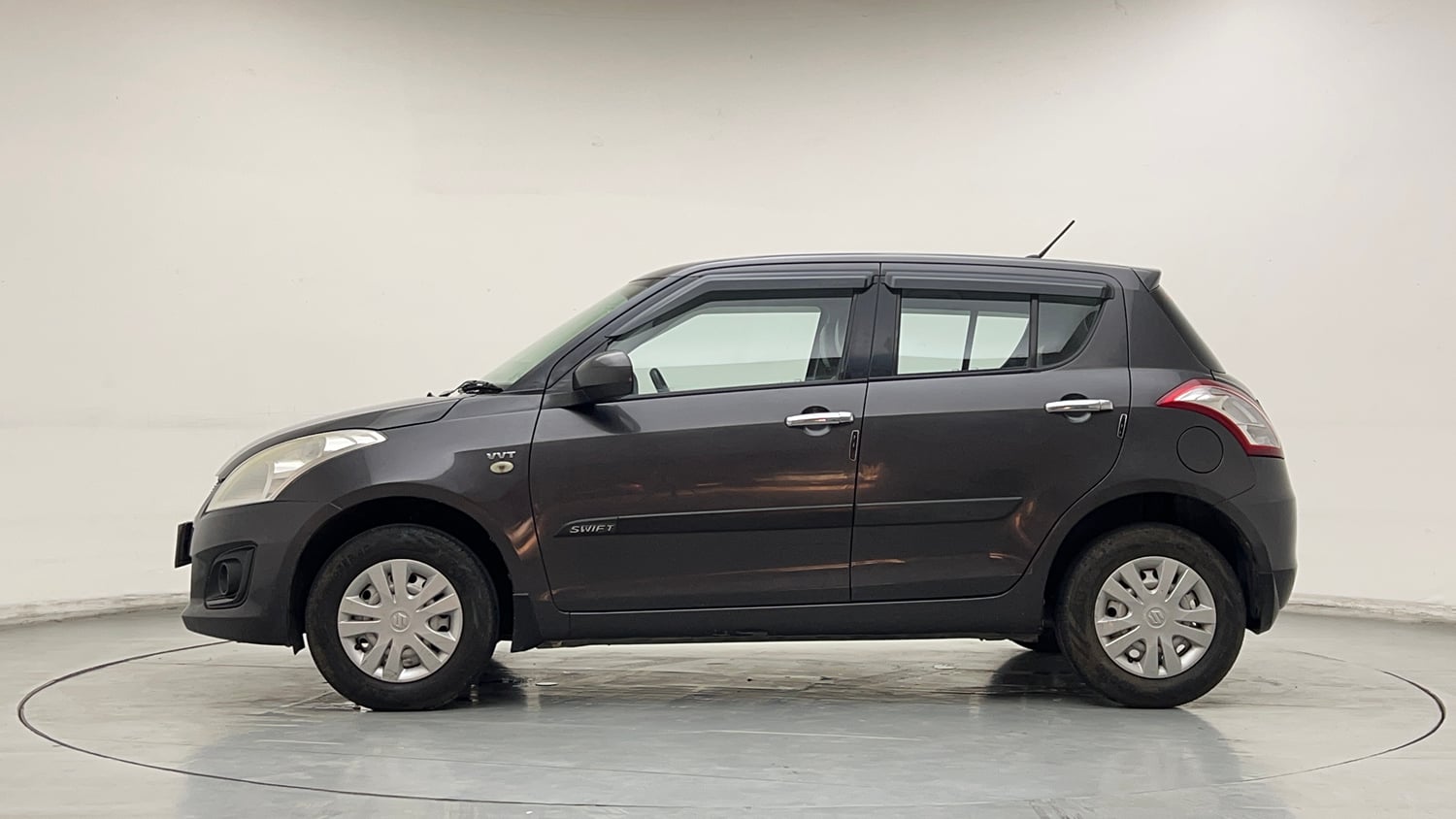 Used 2017 Maruti Suzuki Swift Lxi (O) Petrol Manual exterior LEFT SIDE VIEW