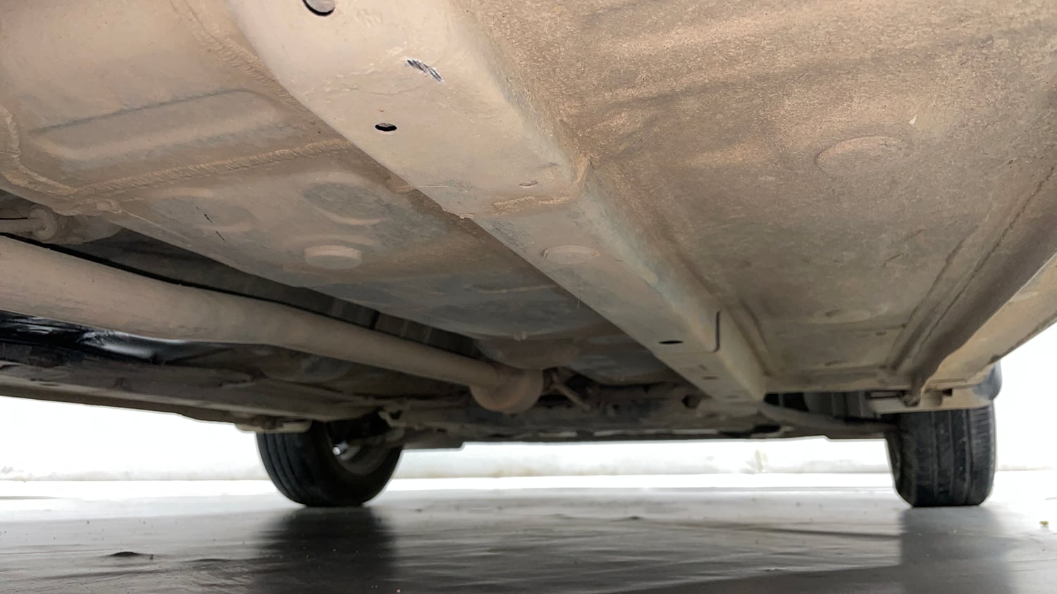 Used 2021 Hyundai Grand i10 Nios Sportz Petrol+cng(outside fitted) Cng Manual extra REAR RIGHT UNDERBODY VIEW