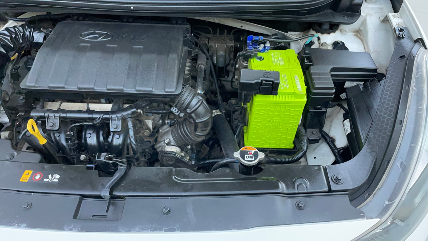 Used 2022 Hyundai Grand i10 Nios Magna 1.2 Kappa VTVT Petrol Manual engine ENGINE LEFT SIDE VIEW