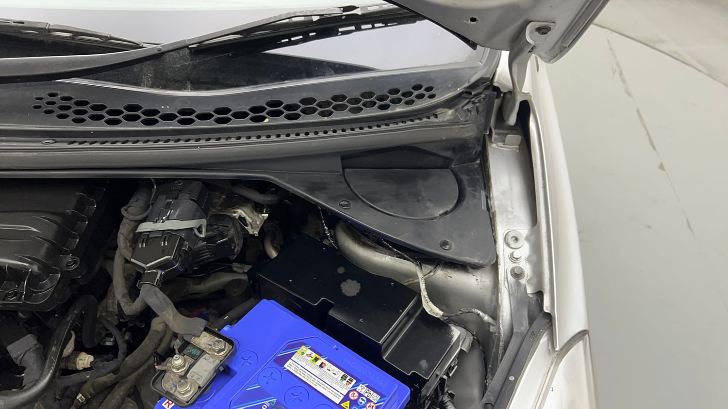 Used 2018 Tata Tiago Revotron XE Petrol Manual engine ENGINE LEFT SIDE HINGE & APRON VIEW
