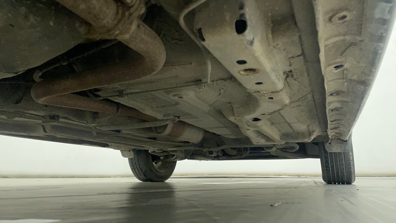 Used 2022 Tata Tigor XZ Plus Petrol Manual extra REAR RIGHT UNDERBODY VIEW