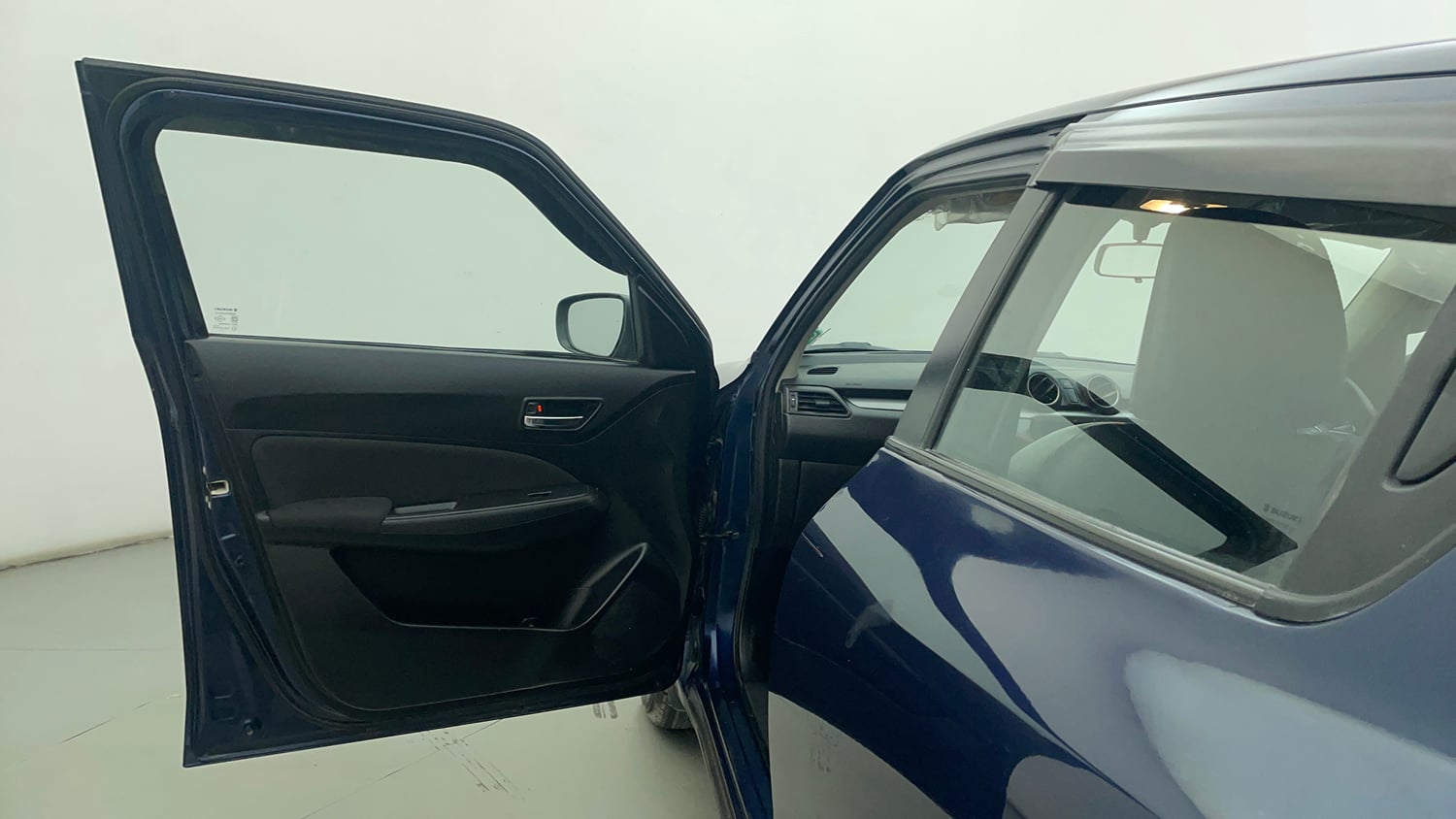 Used 2022 Maruti Suzuki Swift VXi Petrol Manual interior LEFT FRONT DOOR OPEN VIEW