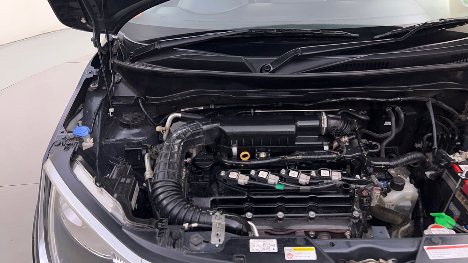 Used 2024 Maruti Suzuki Ignis Zeta 1.2 AMT Petrol Automatic engine ENGINE RIGHT SIDE HINGE & APRON VIEW