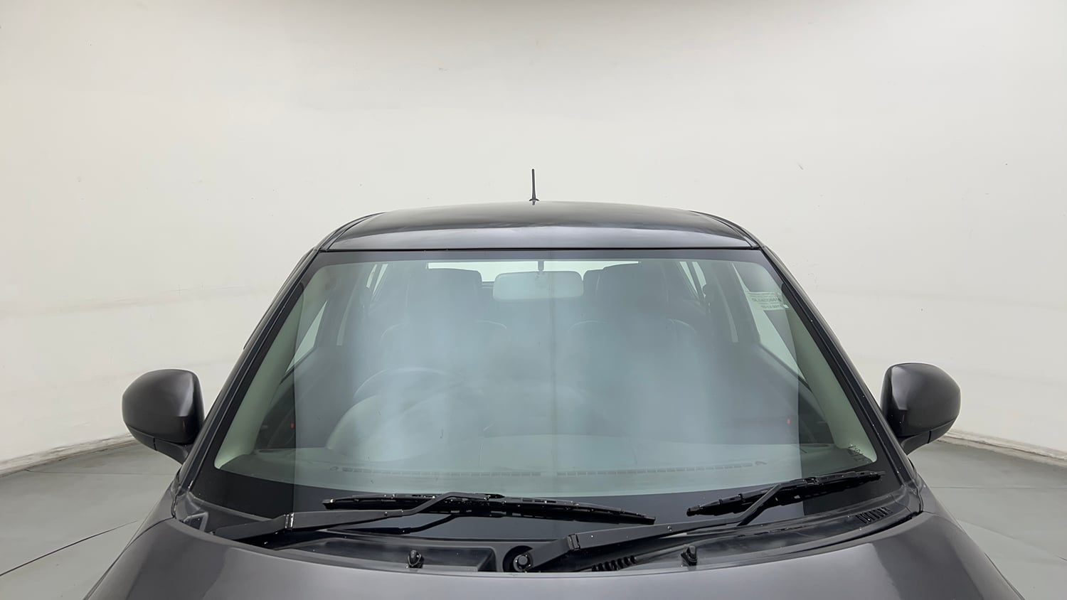 Used 2017 Maruti Suzuki Swift Lxi (O) Petrol Manual exterior FRONT WINDSHIELD VIEW