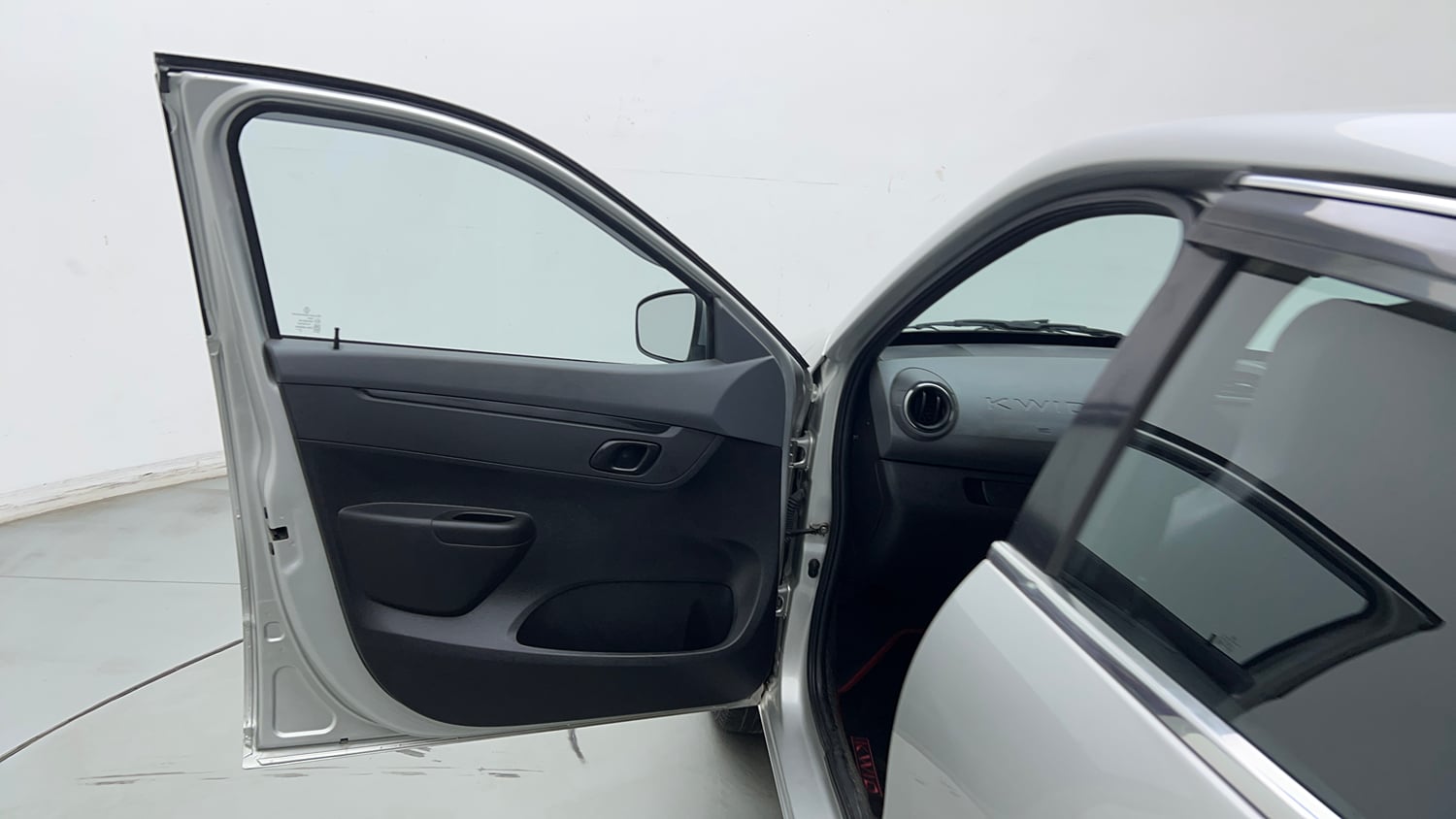 Used 2022 Renault Kwid RXT 1.0 (O) Petrol Manual interior LEFT FRONT DOOR OPEN VIEW