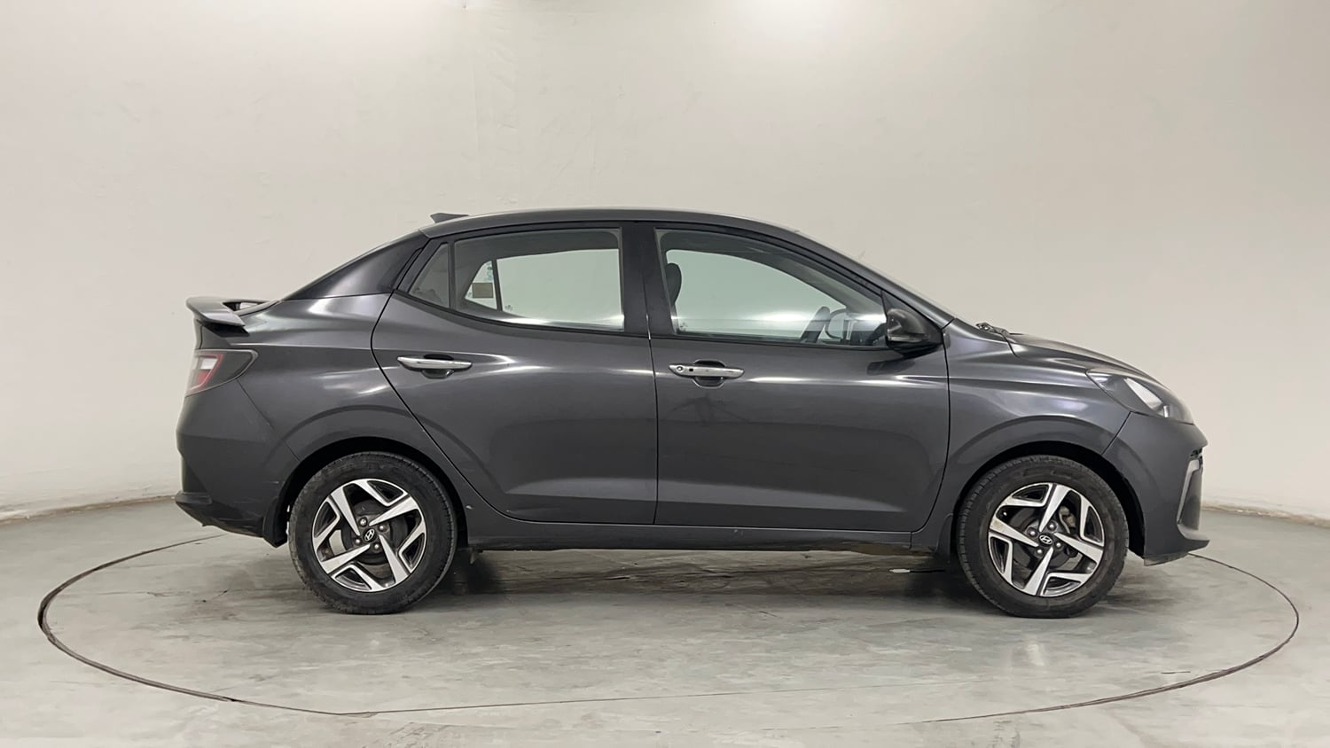 Used 2023 Hyundai Aura SX 1.2 CNG Cng Manual exterior RIGHT SIDE VIEW