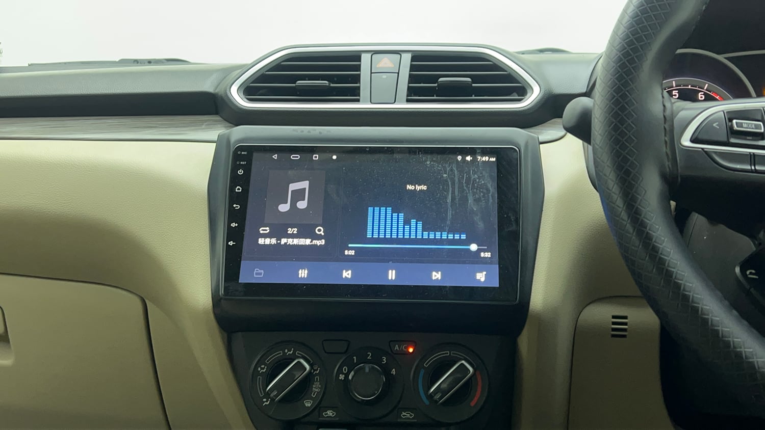 Used 2023 Maruti Suzuki Dzire VXi Petrol Manual top_features Integrated (in-dash) music system