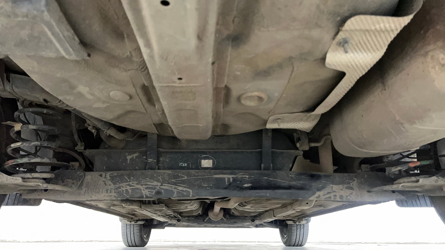Used 2023 Hyundai Aura SX 1.2 CNG Cng Manual extra REAR UNDERBODY VIEW (TAKEN FROM REAR)