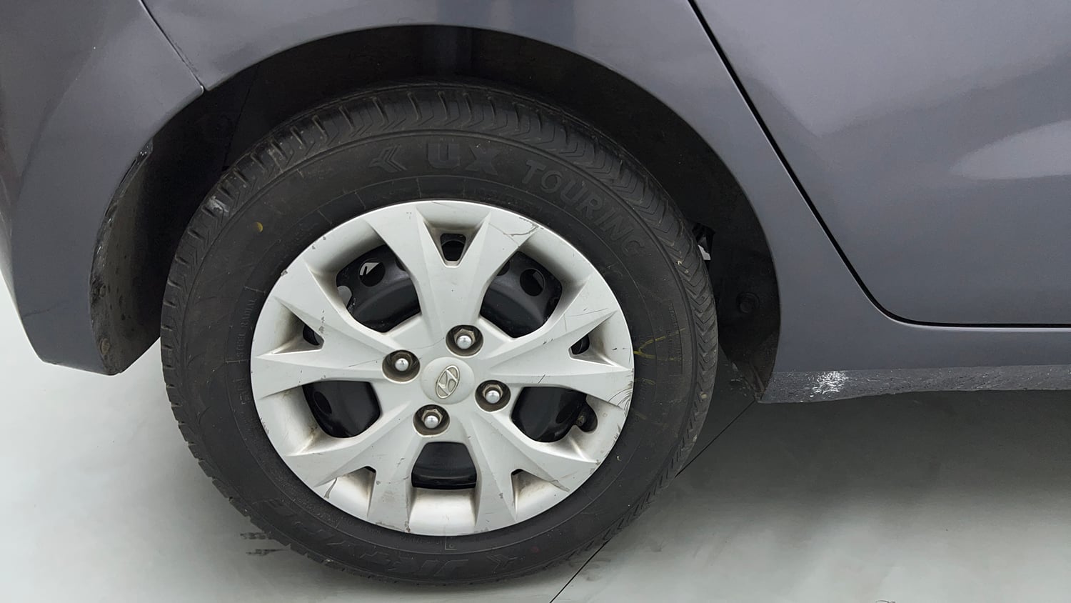 Used 2015 Hyundai Grand i10 Magna 1.2 Kappa VTVT Petrol Manual tyres RIGHT REAR TYRE RIM VIEW