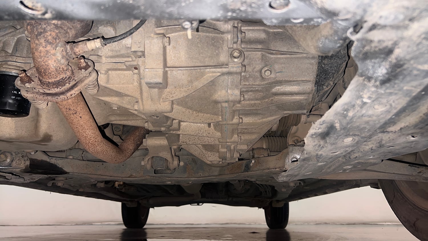 Used 2021 Maruti Suzuki XL6 Alpha MT Petrol Petrol Manual extra FRONT LEFT UNDERBODY VIEW