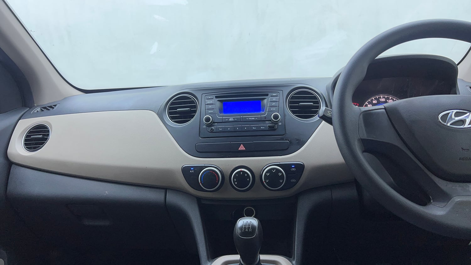 Used 2017 Hyundai Grand i10 Magna 1.2 Kappa VTVT Petrol Manual interior MUSIC SYSTEM & AC CONTROL VIEW