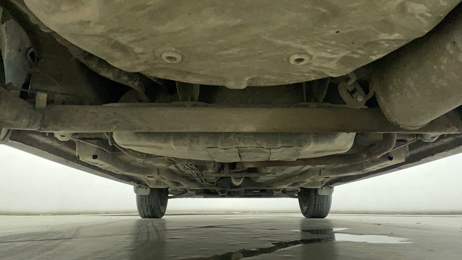 Used 2022 Tata Tigor XZ Plus Petrol Manual extra REAR UNDERBODY VIEW (TAKEN FROM REAR)
