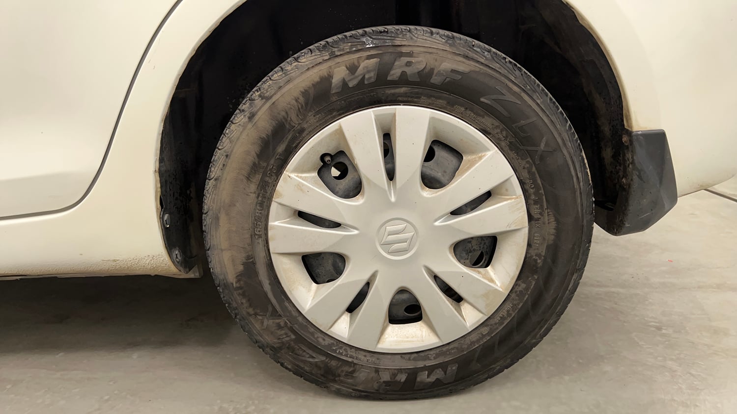 Used 2012 Maruti Suzuki Swift Dzire VXI Petrol Manual tyres LEFT REAR TYRE RIM VIEW