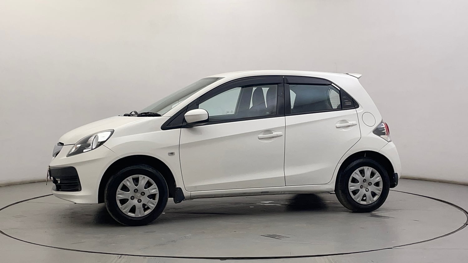 Used 2014 Honda Brio S MT Petrol Manual exterior LEFT SIDE VIEW