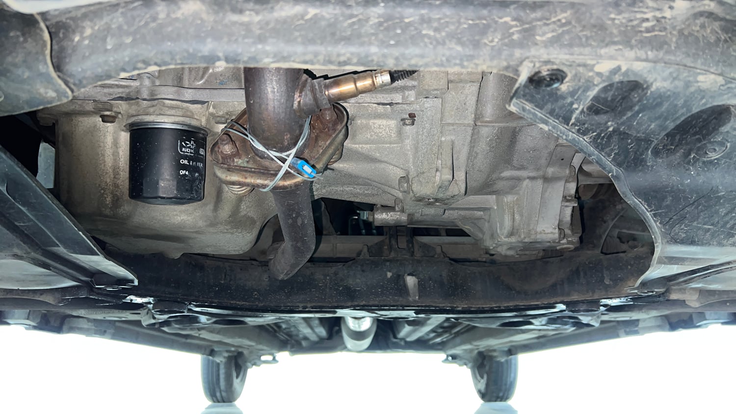 Used 2017 Maruti Suzuki Swift Lxi (O) Petrol Manual extra FRONT LEFT UNDERBODY VIEW