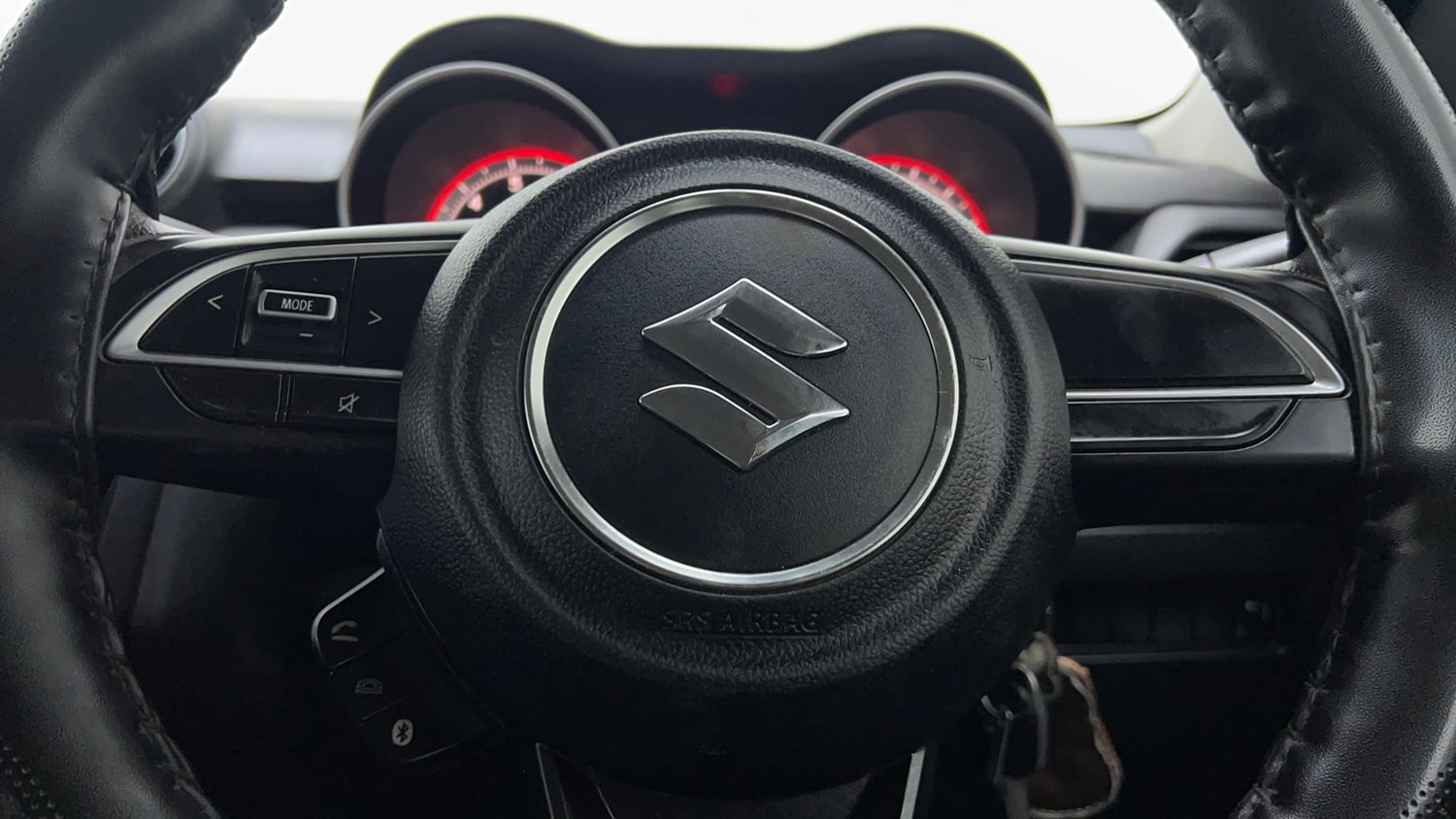 Used 2023 Maruti Suzuki Swift VXi Petrol Manual top_features Steering mounted controls