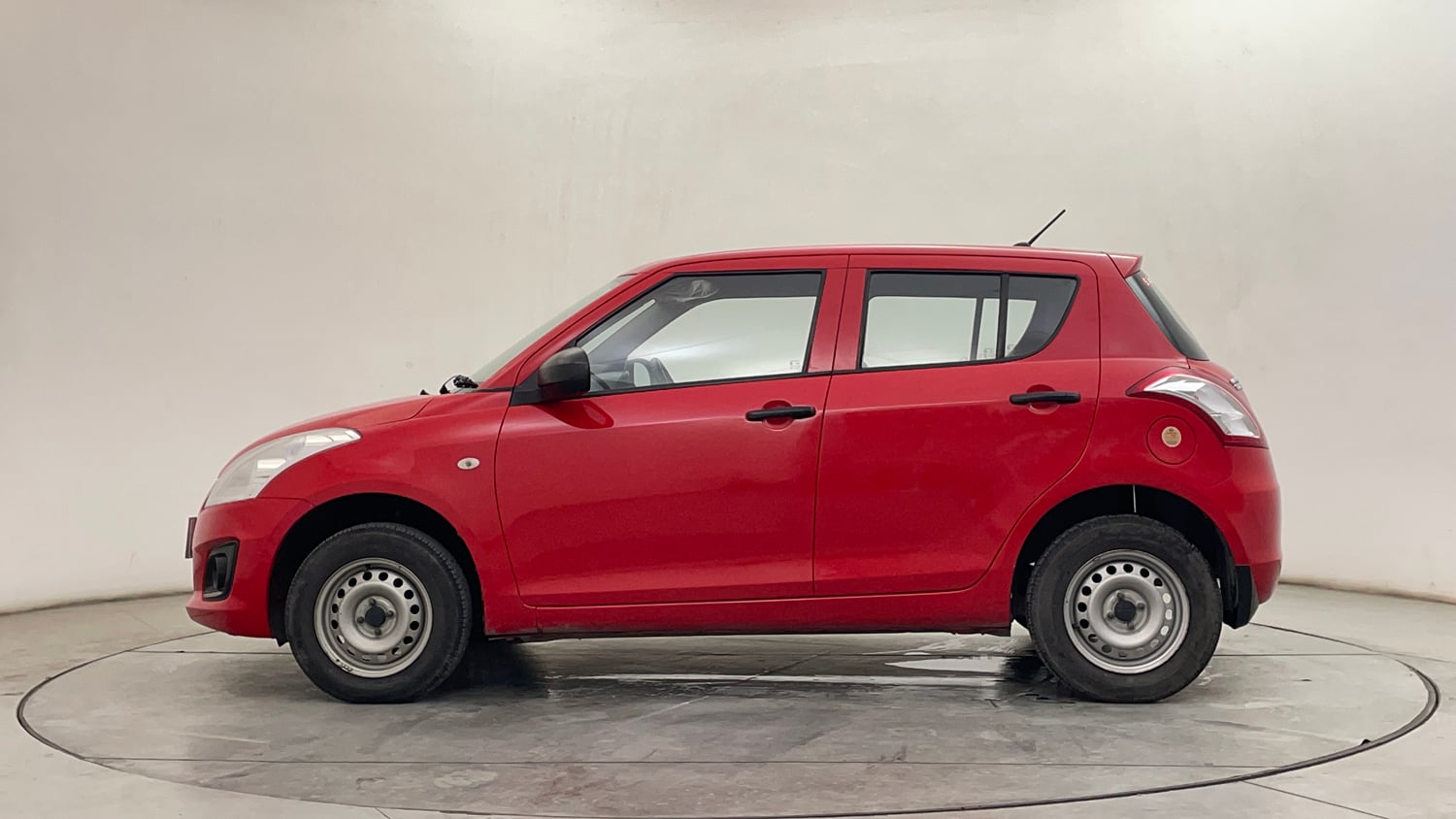 Used 2017 Maruti Suzuki Swift Lxi ABS (O) Petrol Manual exterior LEFT SIDE VIEW