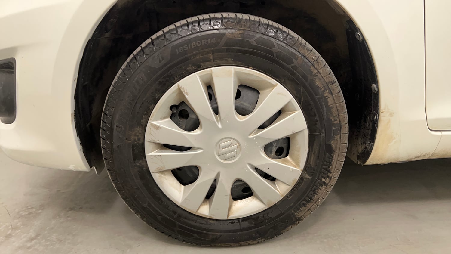 Used 2012 Maruti Suzuki Swift Dzire VXI Petrol Manual tyres LEFT FRONT TYRE RIM VIEW