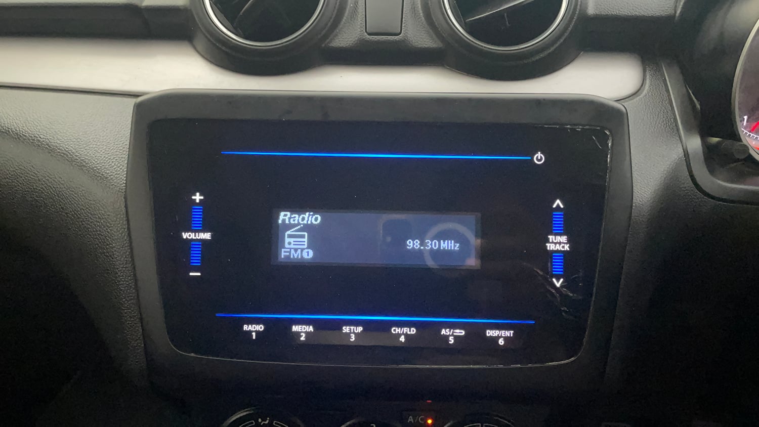Used 2022 Maruti Suzuki Swift VXi Petrol Manual top_features Integrated (in-dash) music system