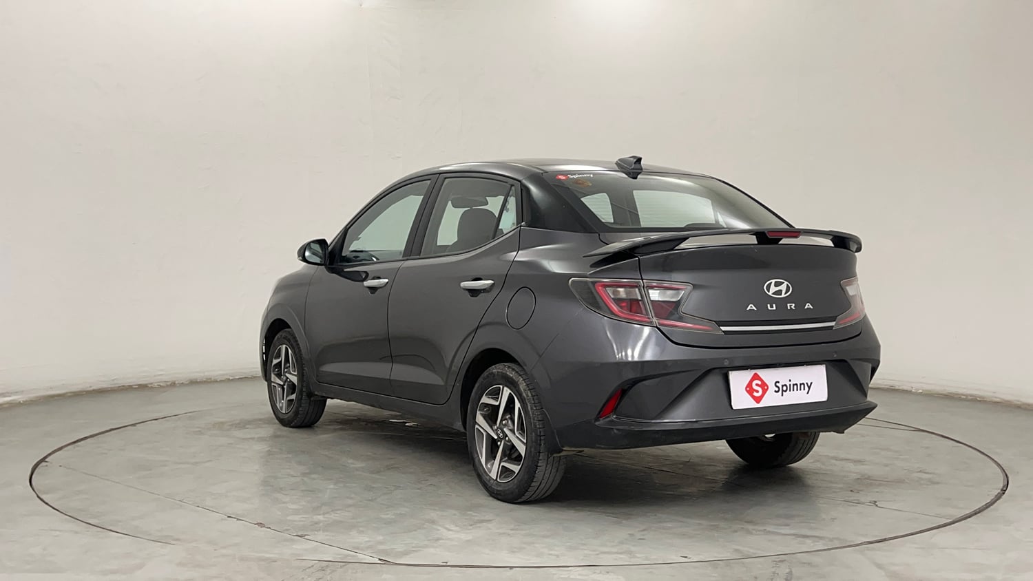 Used 2023 Hyundai Aura SX 1.2 CNG Cng Manual exterior LEFT REAR CORNER VIEW