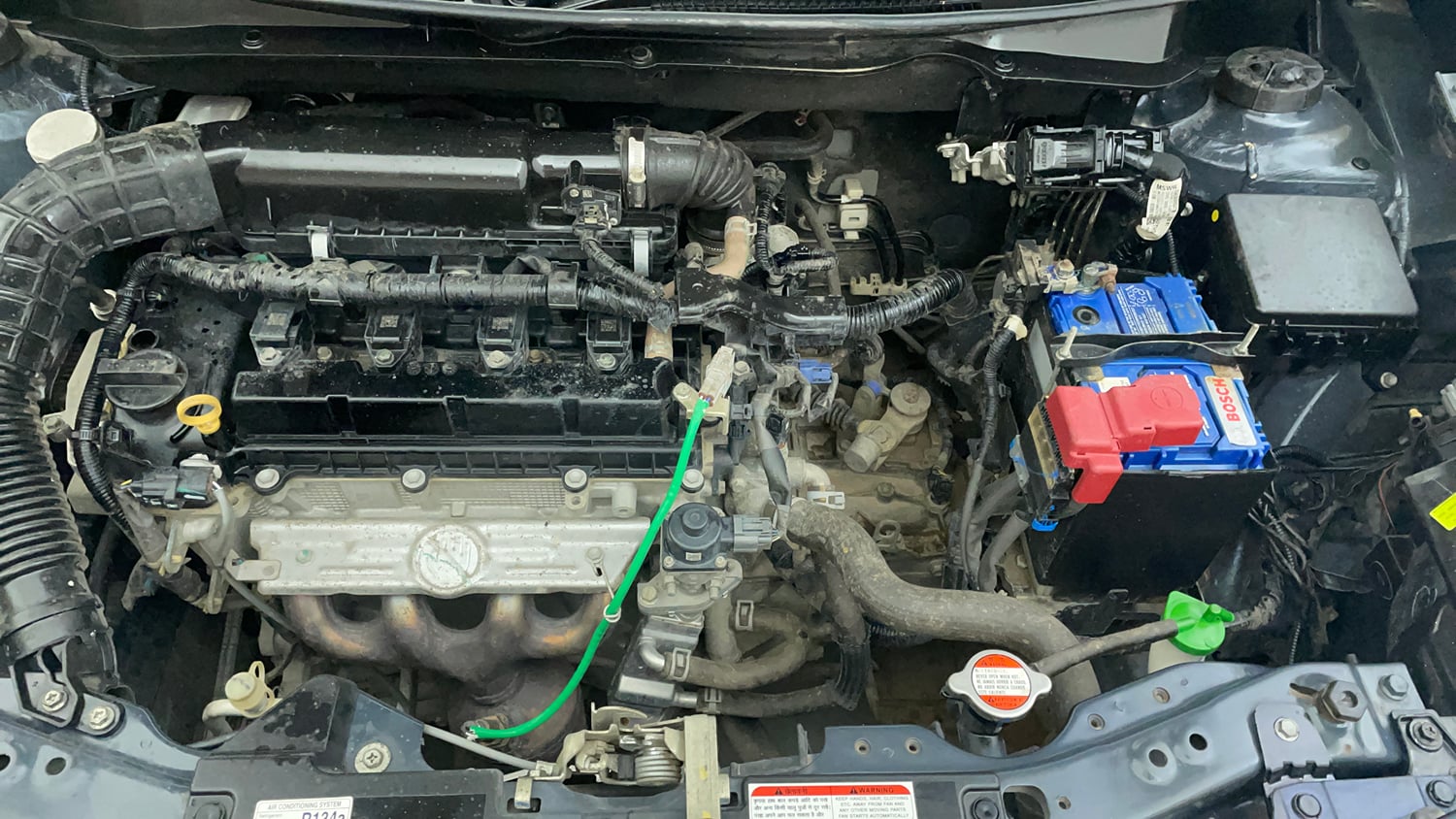 Used 2022 Maruti Suzuki Swift VXi Petrol Manual engine ENGINE LEFT SIDE VIEW