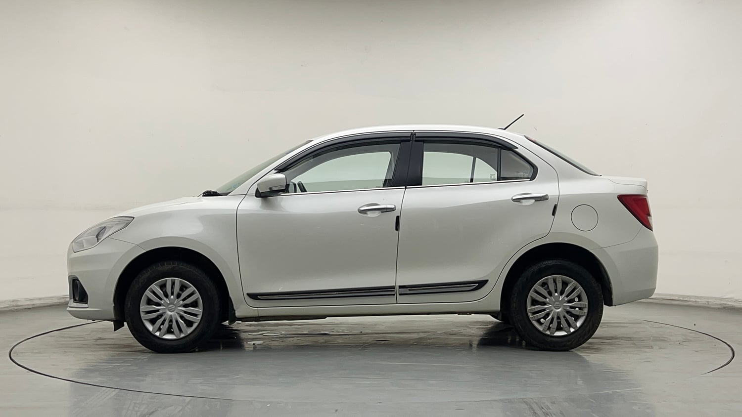 Used 2023 Maruti Suzuki Dzire VXi Petrol Manual exterior LEFT SIDE VIEW
