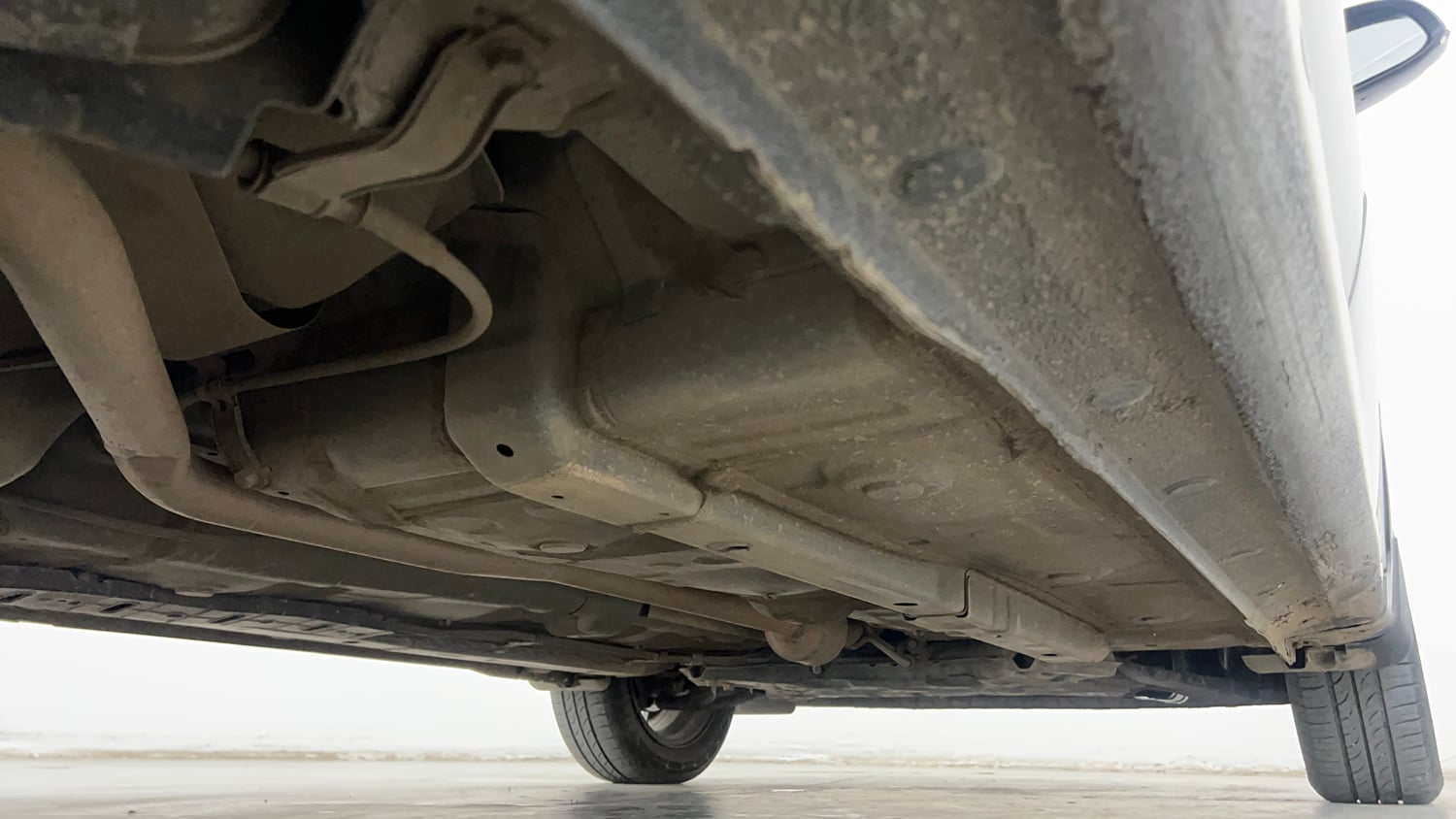 Used 2023 Hyundai Aura SX 1.2 CNG Cng Manual extra REAR RIGHT UNDERBODY VIEW