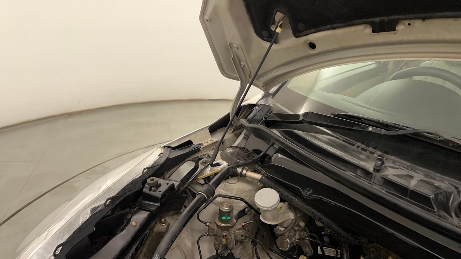 Used 2012 Maruti Suzuki Swift Dzire VXI Petrol Manual engine ENGINE RIGHT SIDE HINGE & APRON VIEW