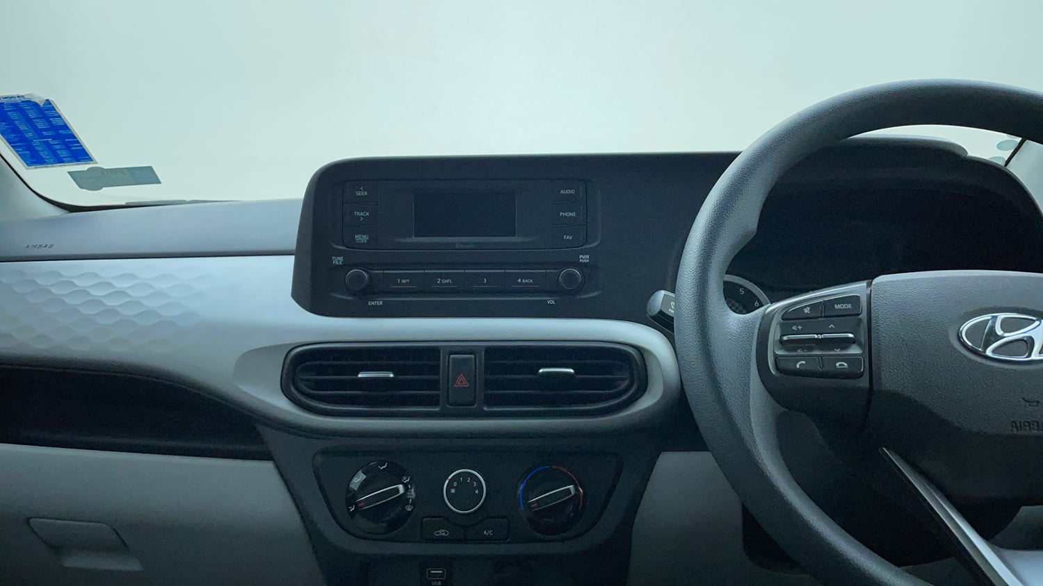 Used 2022 Hyundai Grand i10 Nios Magna 1.2 Kappa VTVT Petrol Manual interior MUSIC SYSTEM & AC CONTROL VIEW